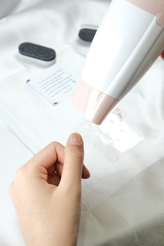 Use a hairdryer to heat your stickers before peeling them